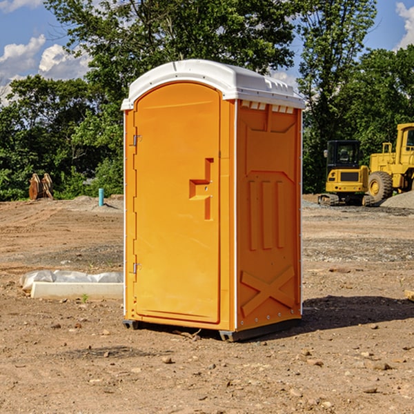 how often are the porta potties cleaned and serviced during a rental period in Isanti